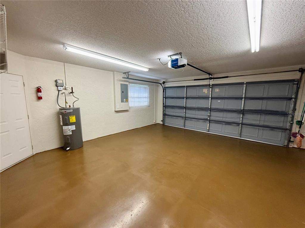 8037 Southwest 115th Loop Ocala, FL 34481 - Photo 47 of 47 a view of an empty room with a fireplace