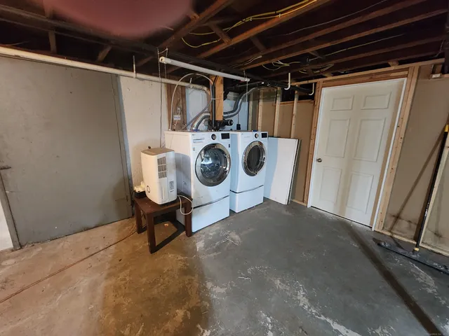 a view of a backyard with a entertaining space