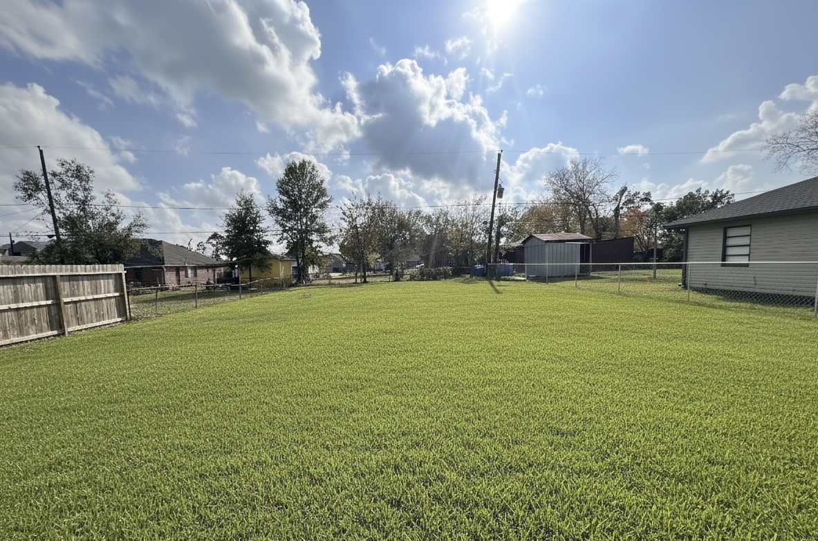 13430 Orleans Street Houston, TX 77015 - Photo 1 of 6 a swimming pool that is in the middle of a field