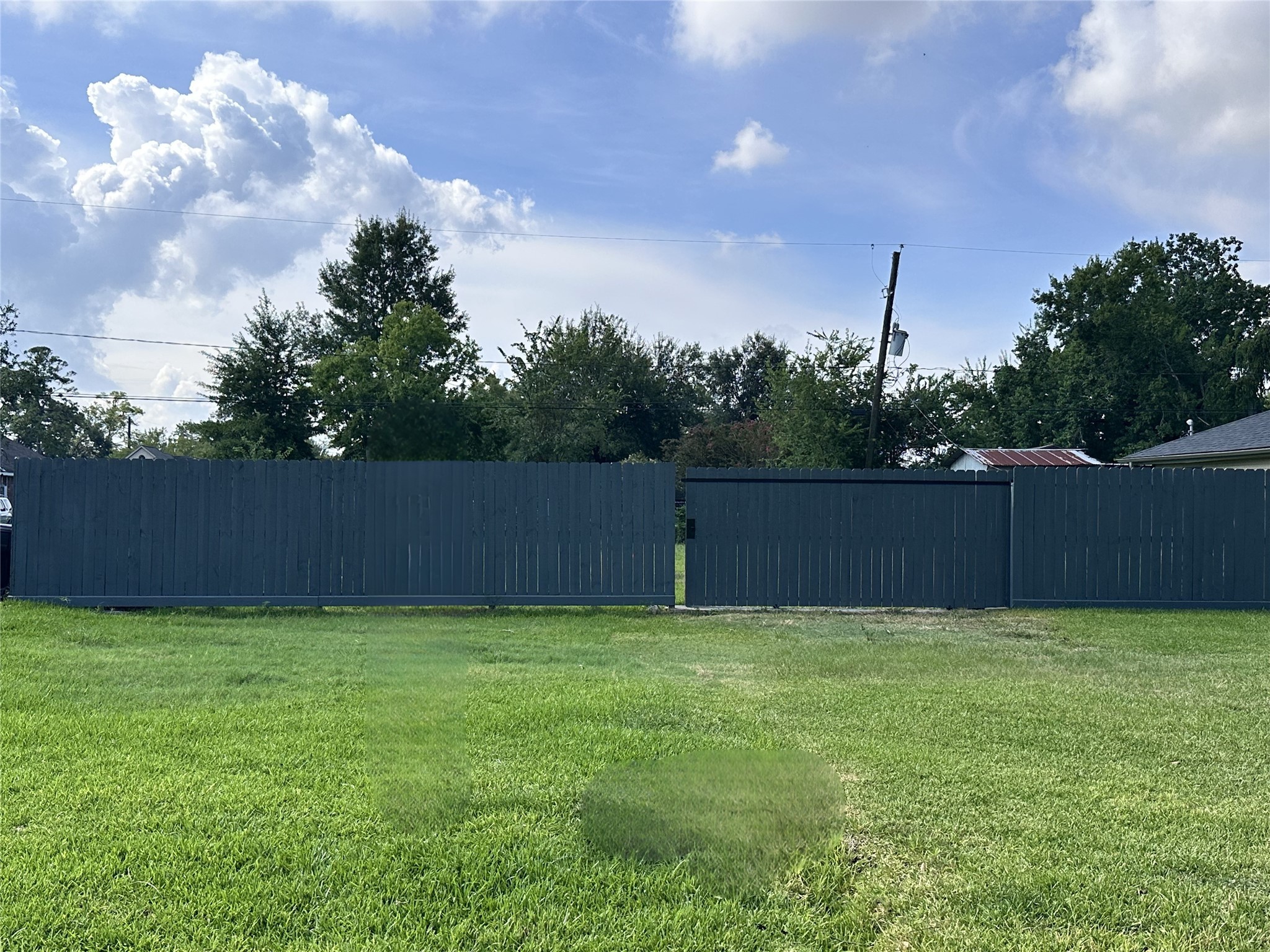 13430 Orleans Street Houston, TX 77015 - Photo 2 of 6 a view of a yard with a fence