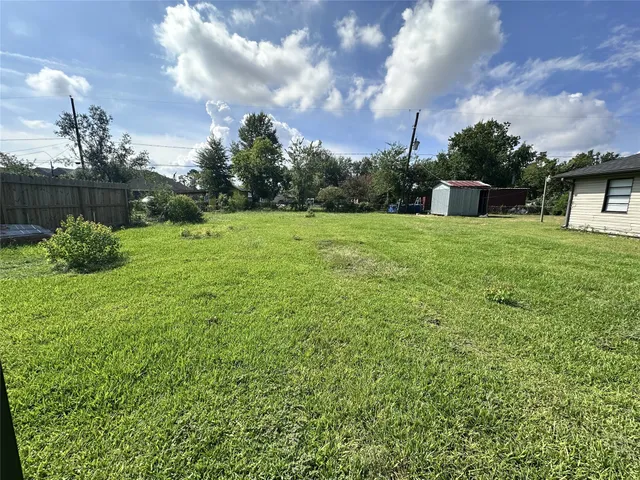 a fire hydrant in the middle of a field