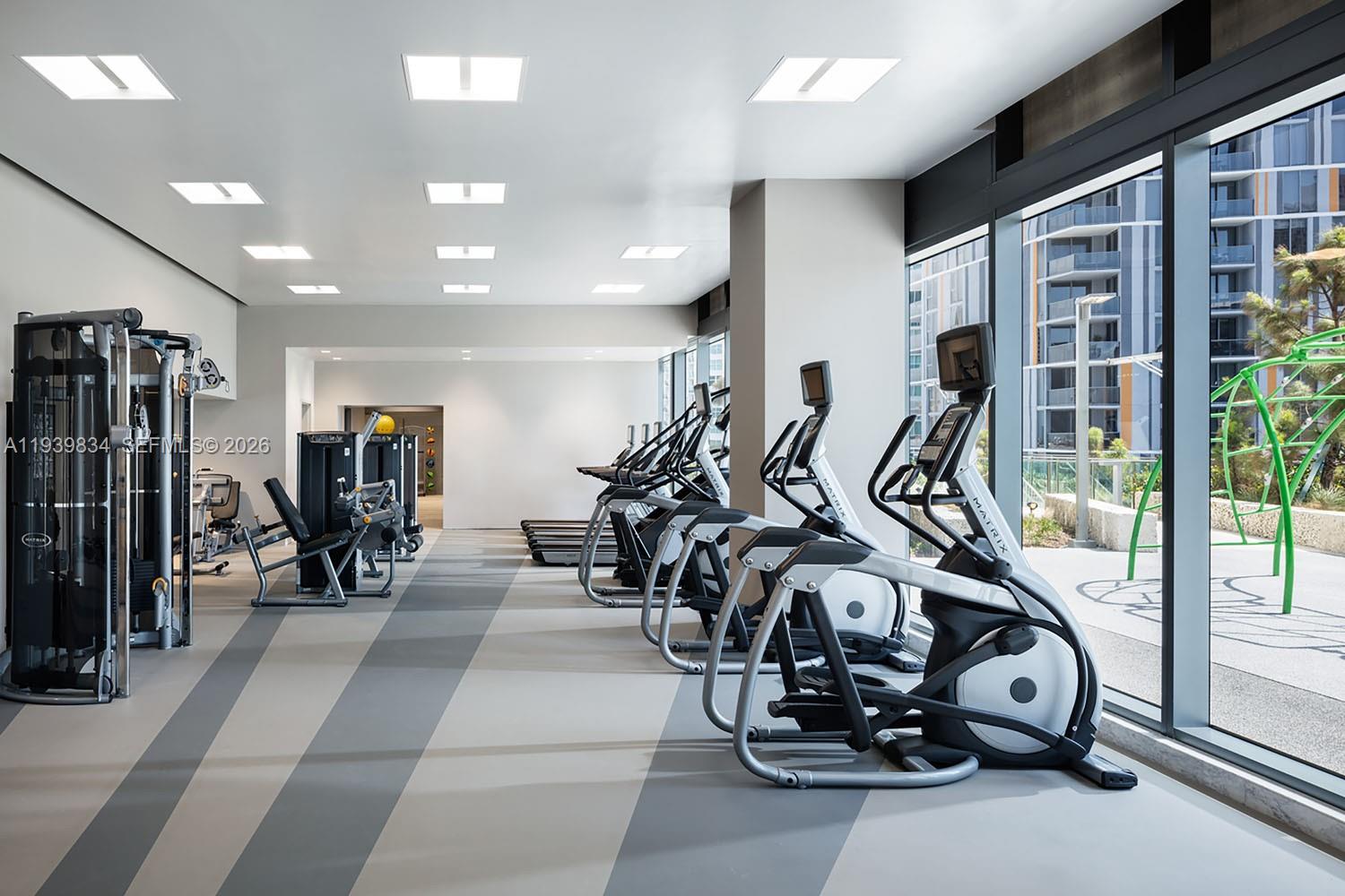 88 Southwest 7th Street, Unit 3403 Miami, FL 33130 - Photo 28 of 37 a view of a room with gym equipment