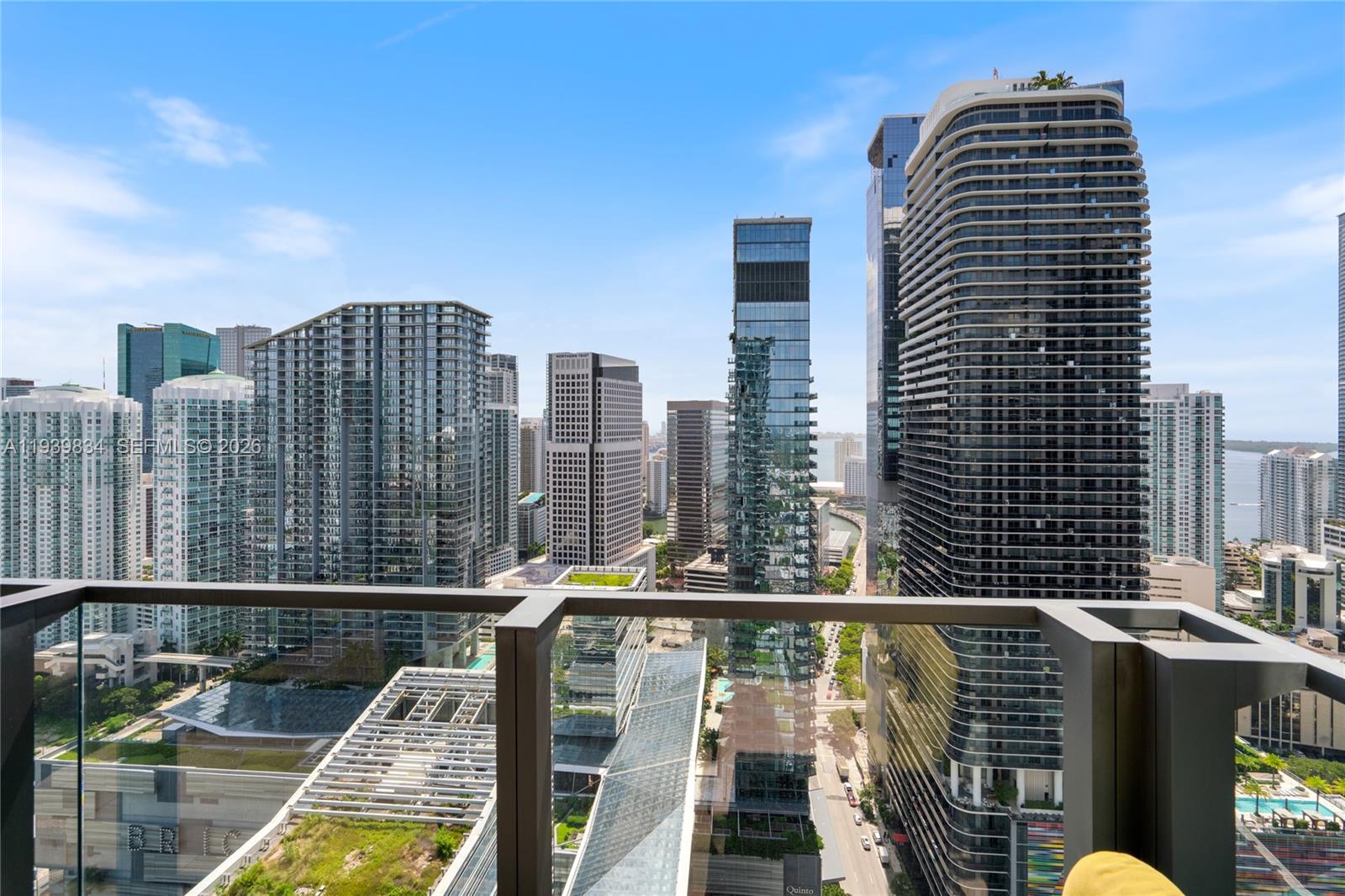 88 Southwest 7th Street, Unit 3403 Miami, FL 33130 - Photo 33 of 37 a view of balcony with a floor to ceiling windows