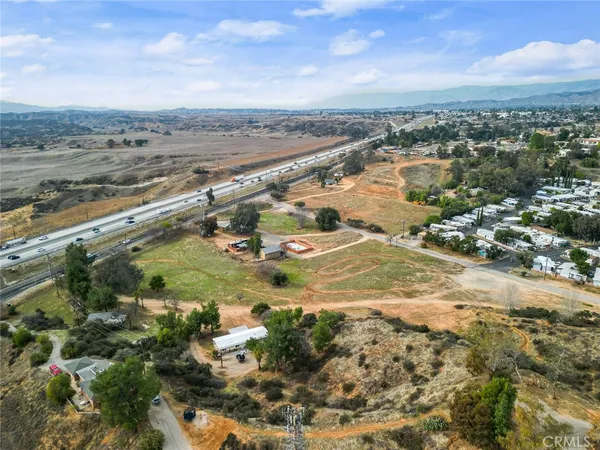 an aerial view of residential building and ocean view