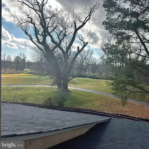 a view of a yard with an outdoor space