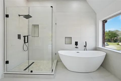 an empty room with a bathroom