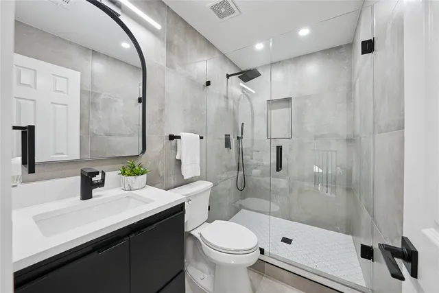 an empty room with a empty space and windows