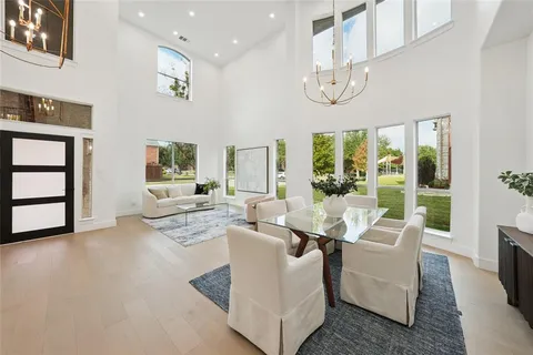 a living room with fireplace furniture and a flat screen tv