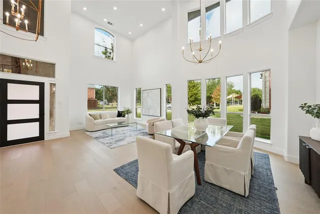 a living room with fireplace furniture and a flat screen tv