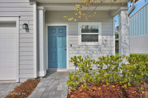 a view of a entryway door front of house