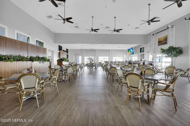 a view of houses with an outdoor space and lakeside