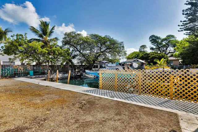 a house view with a backyard space