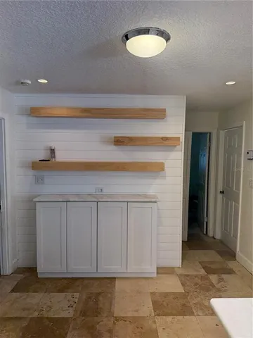 a view of a hallway with closet