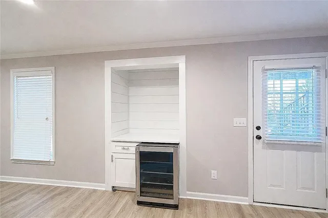 a view of wooden floor in an empty room