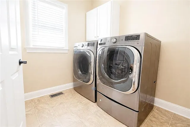 a front view of a house with a garage