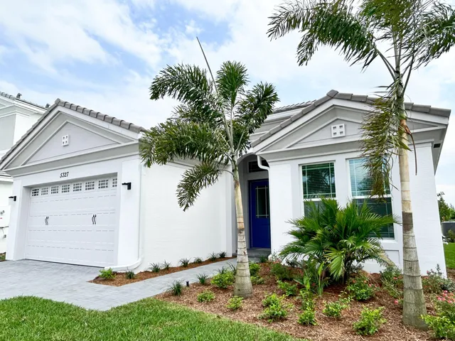 a front view of house with yard