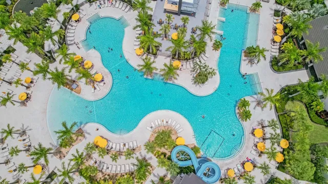 an aerial view of a house with a ocean view