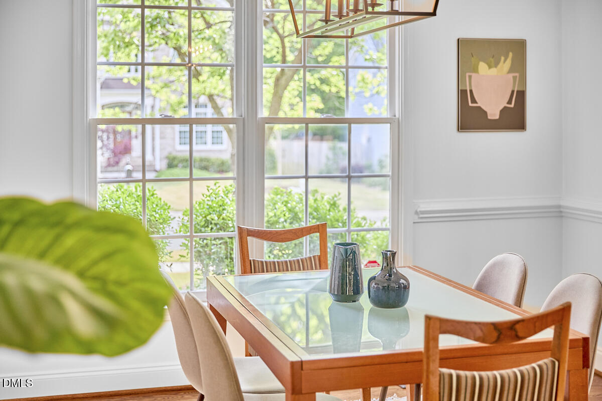 8030 Sundance Circle Durham, NC 27713 - Photo 12 of 61 a view of a dining room with furniture window and outside view