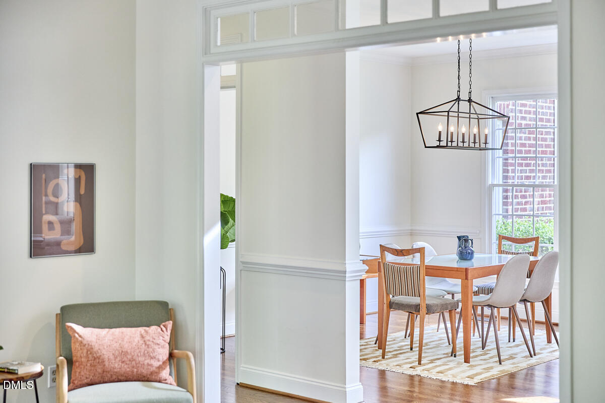 8030 Sundance Circle Durham, NC 27713 - Photo 23 of 61 a dining room with furniture and chandelier