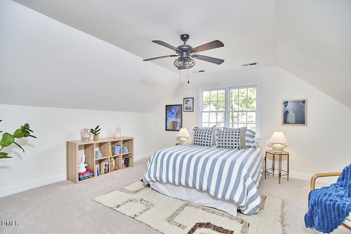 8030 Sundance Circle Durham, NC 27713 - Photo 48 of 61 a bedroom with a bed furniture and a window