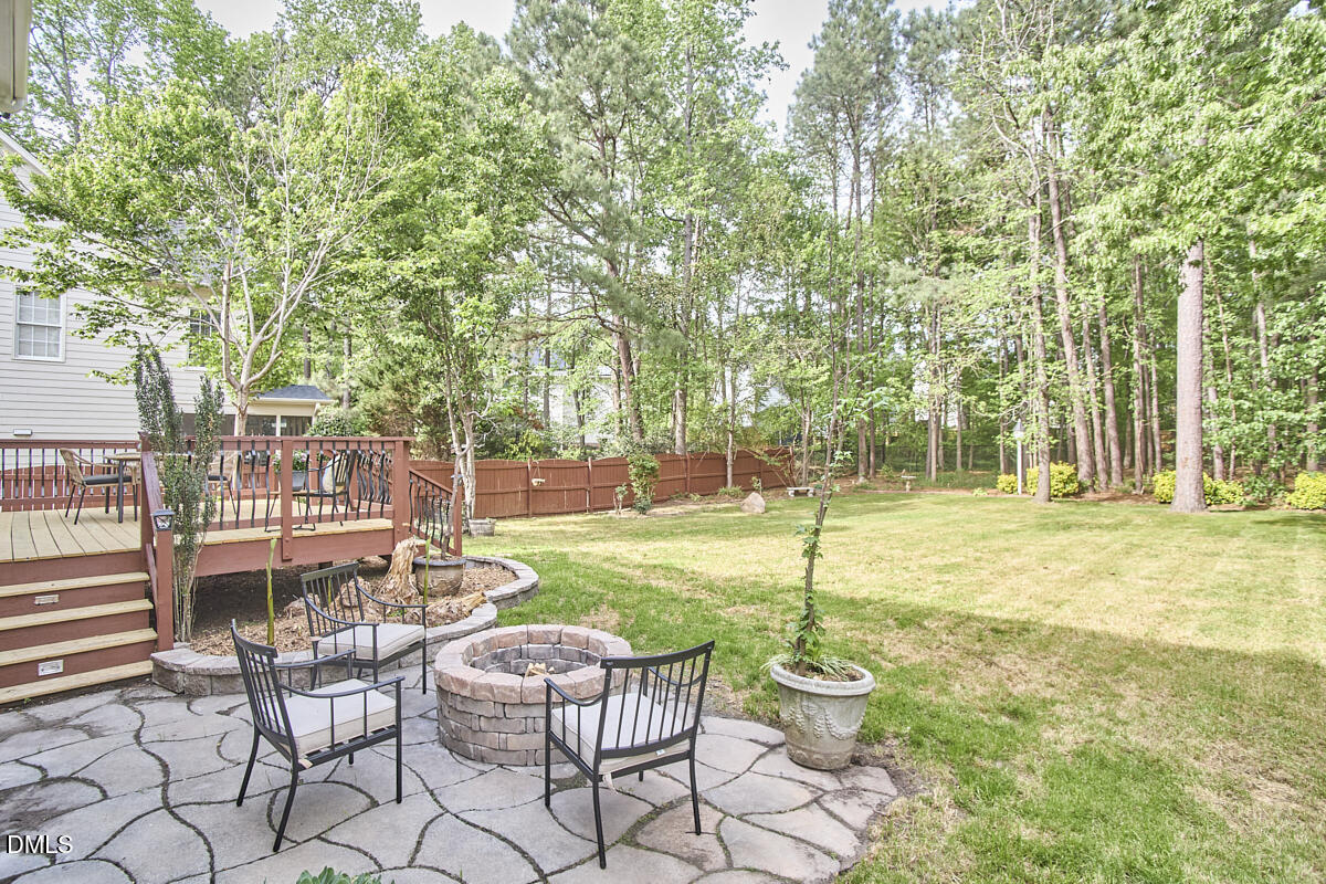 8030 Sundance Circle Durham, NC 27713 - Photo 53 of 61 a view of a chair and tables in the patio