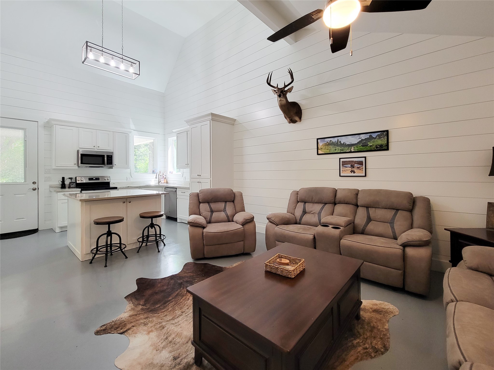 4937 Wolff Road Round Top, TX 78954 - Photo 31 of 31 Experience a seamless open floor plan with a bright kitchen, perfect for casual living.