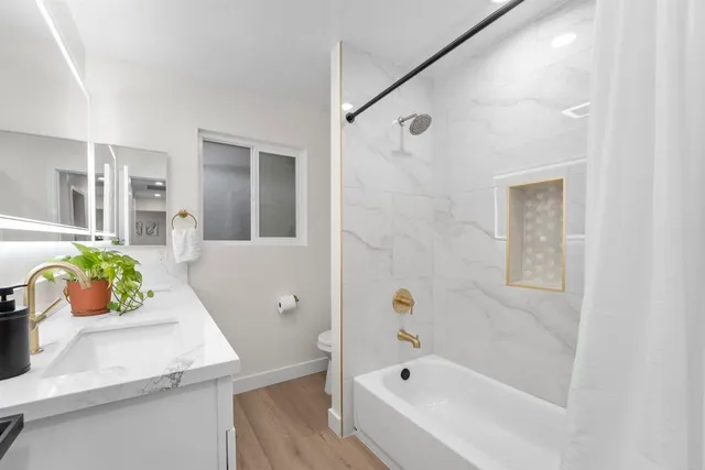 a bathroom with a sink and a bathtub