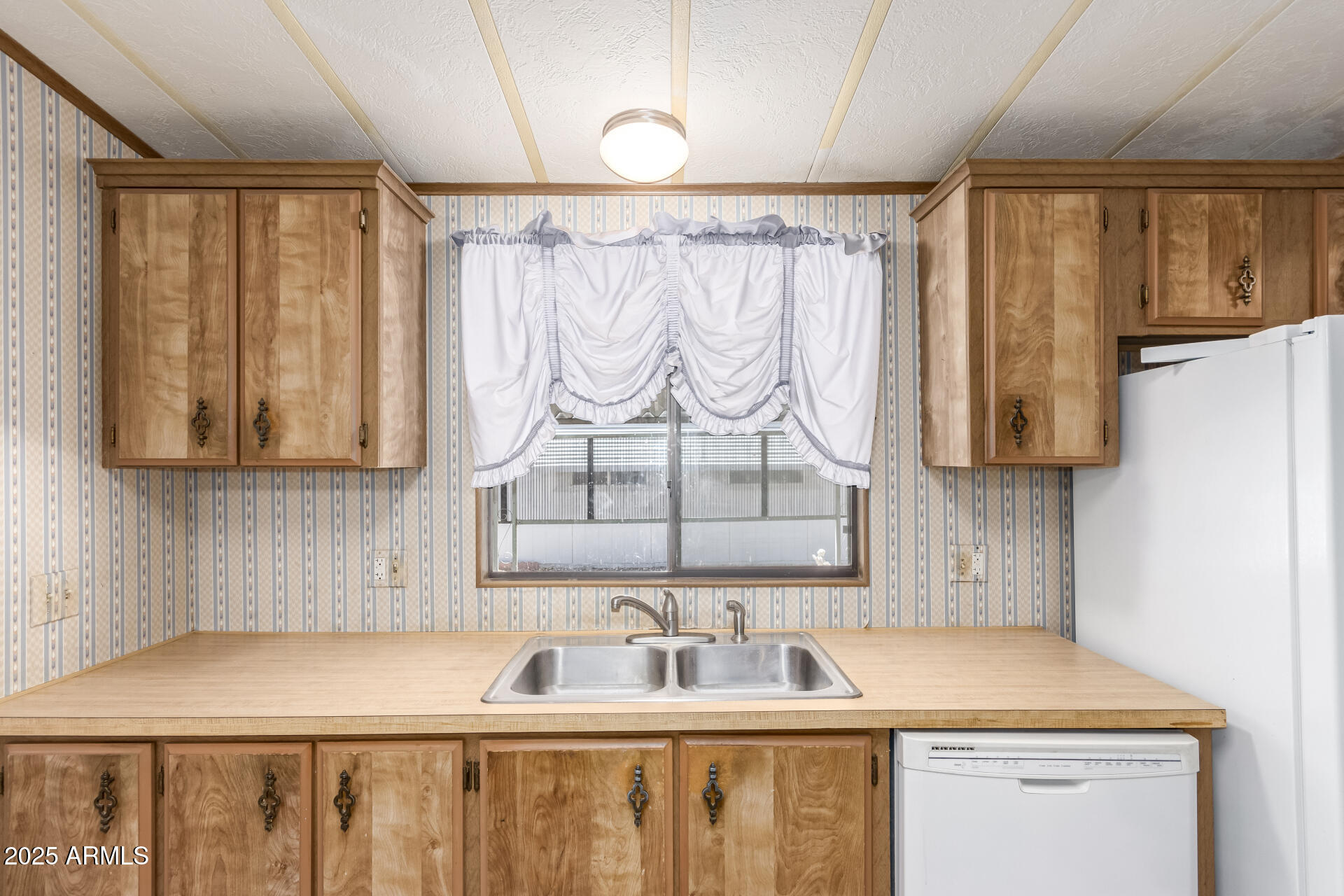 2100 North Trekell Road, Unit 229 Casa Grande, AZ 85122 - Photo 16 of 30 a bathroom with a sink and a mirror