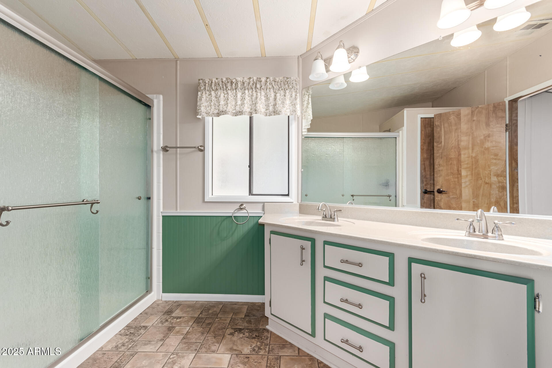 2100 North Trekell Road, Unit 229 Casa Grande, AZ 85122 - Photo 20 of 30 a bathroom with a sink and a mirror