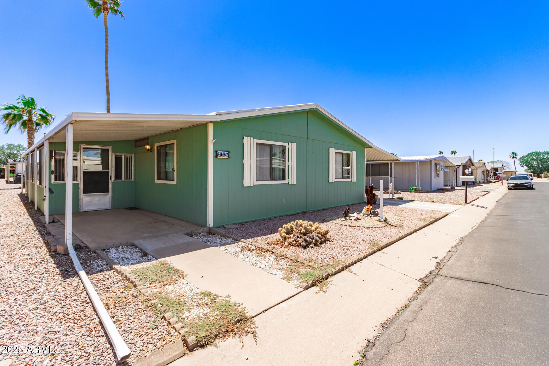 2100 North Trekell Road, Unit 229 Casa Grande, AZ 85122 - Photo 2 of 30 a view of a house with backyard