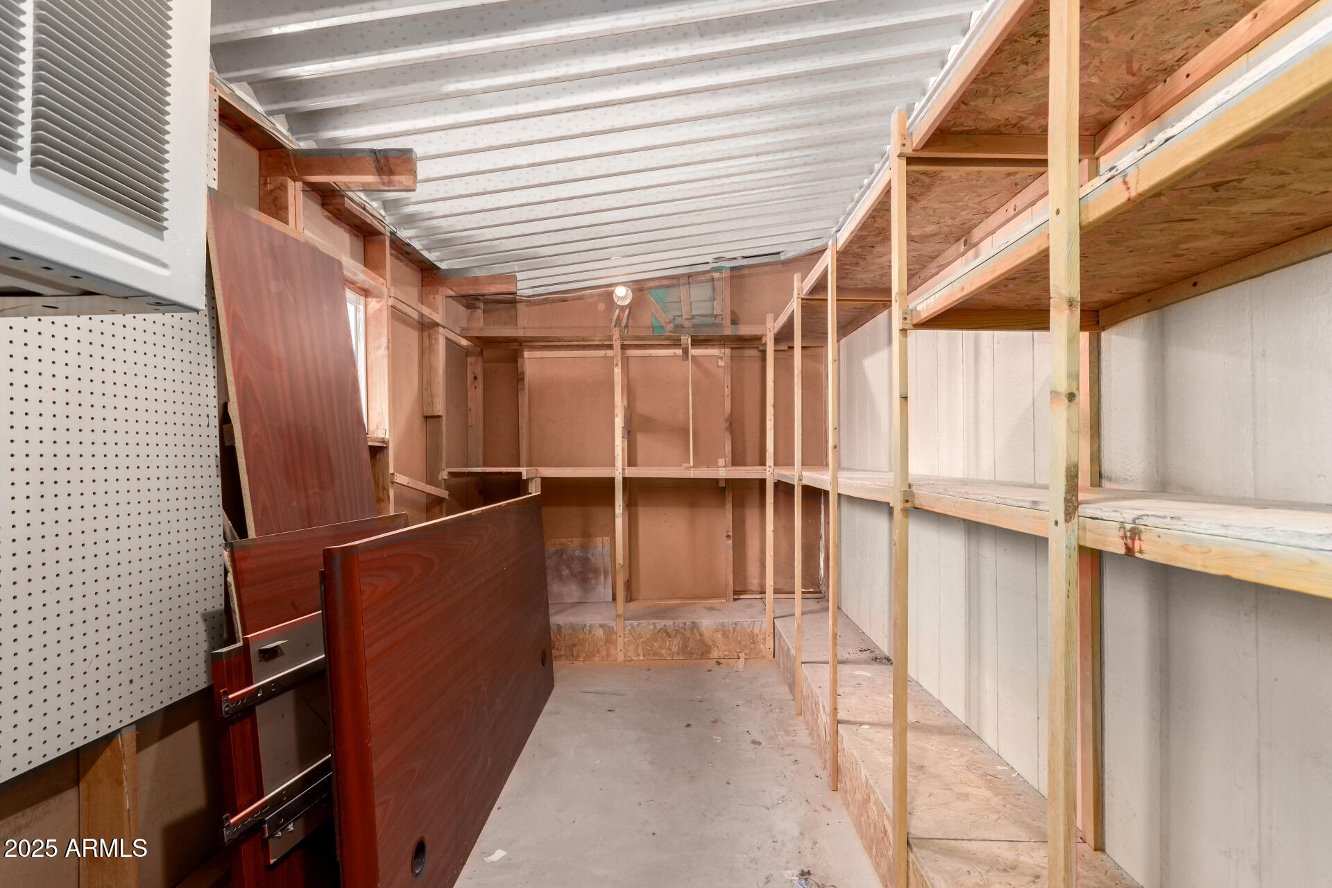 2100 North Trekell Road, Unit 229 Casa Grande, AZ 85122 - Photo 27 of 30 a view of closet with wooden floor