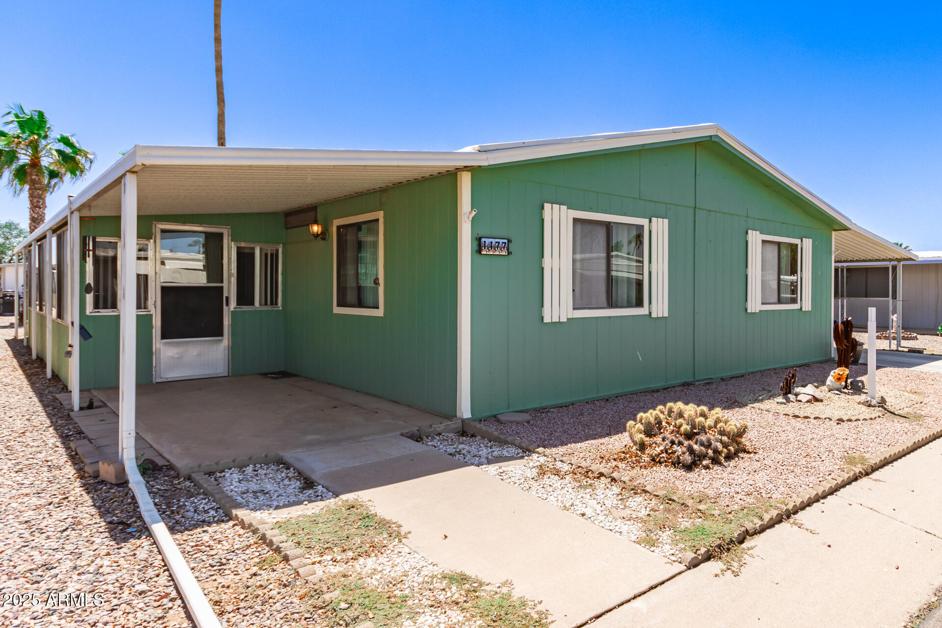 2100 North Trekell Road, Unit 229 Casa Grande, AZ 85122 - Photo 3 of 30 a backyard of a house