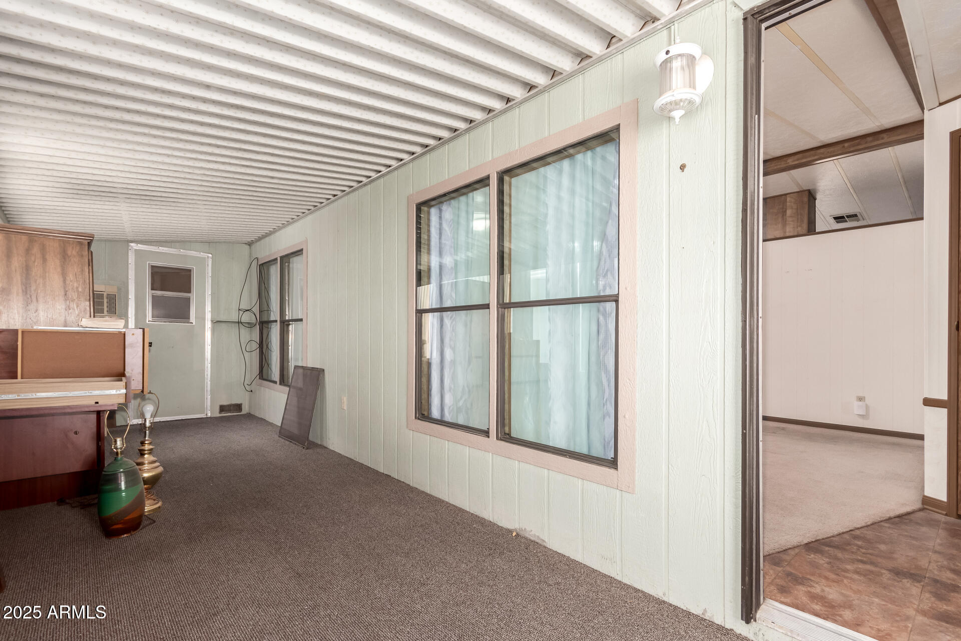 2100 North Trekell Road, Unit 229 Casa Grande, AZ 85122 - Photo 7 of 30 a view of livingroom with furniture and windows