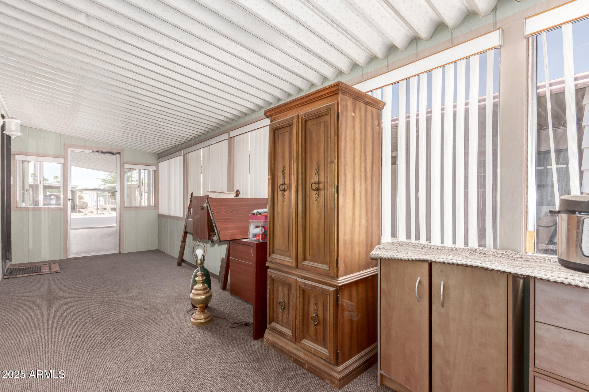 2100 North Trekell Road, Unit 229 Casa Grande, AZ 85122 - Photo 8 of 30 a view of a room with furniture and windows