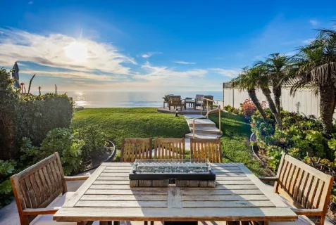 a view of chairs and table in patio