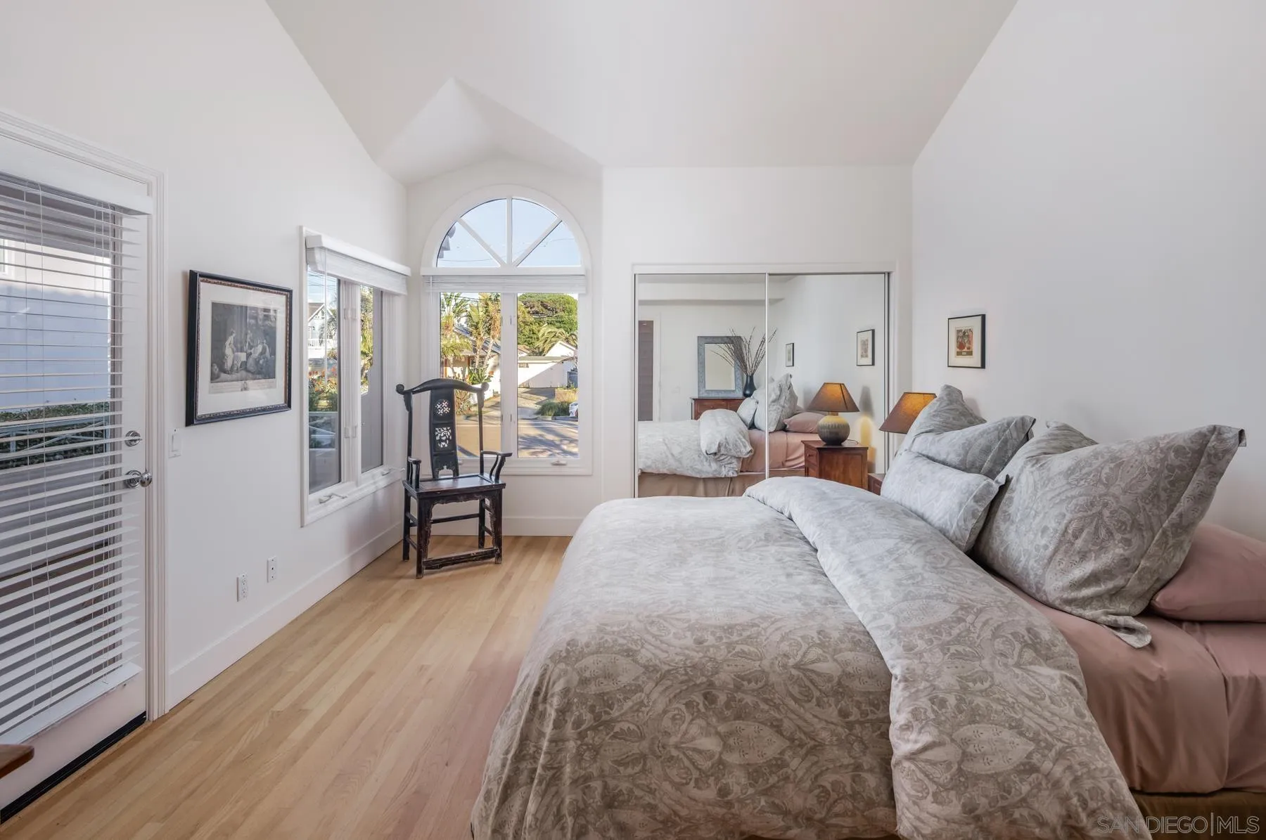 538 4th Street Encinitas, CA 92024 - Photo 25 of 35 a bed room with a bed and a chair