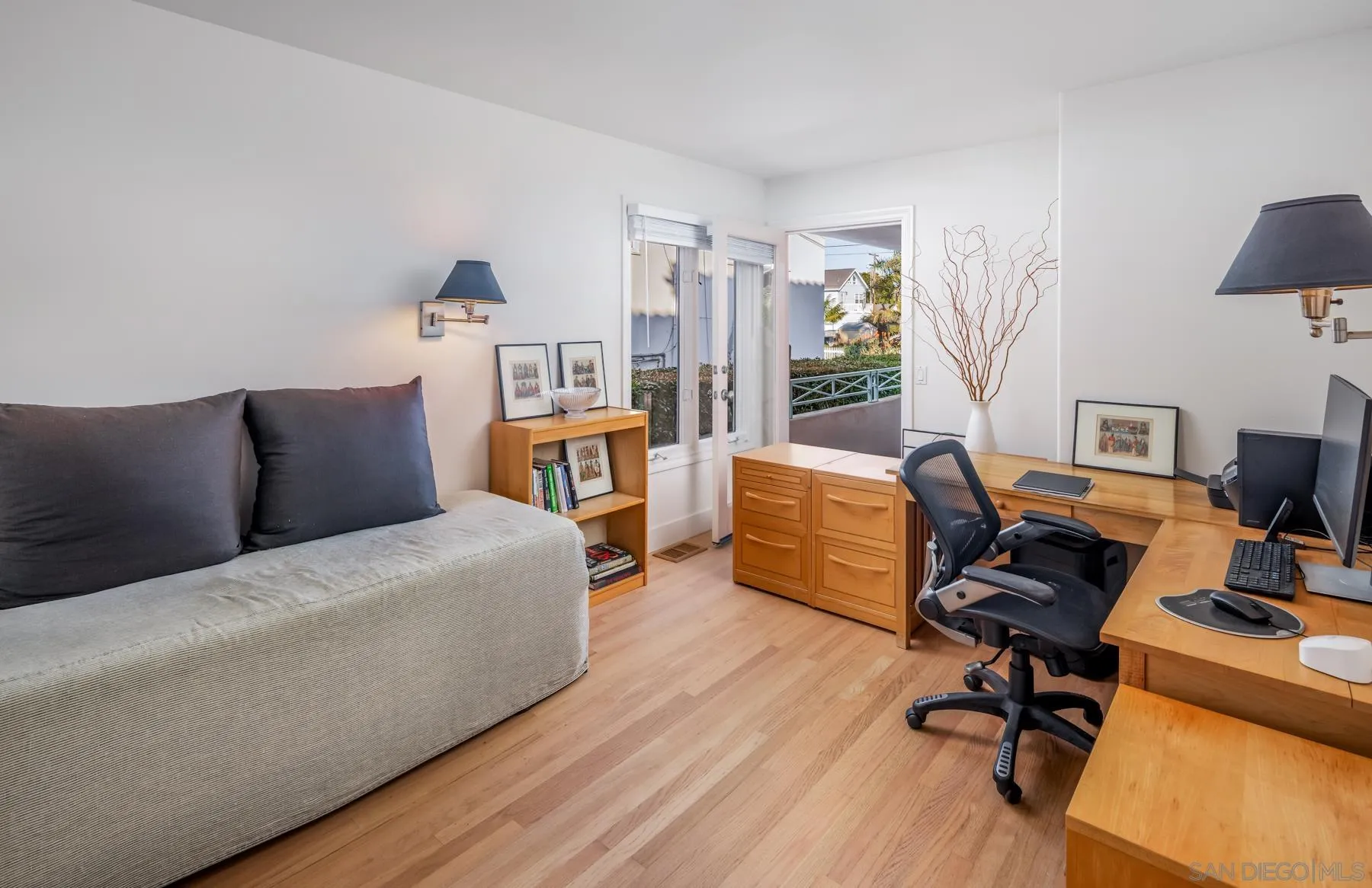 538 4th Street Encinitas, CA 92024 - Photo 27 of 35 a view of a livingroom with workspace and a couch