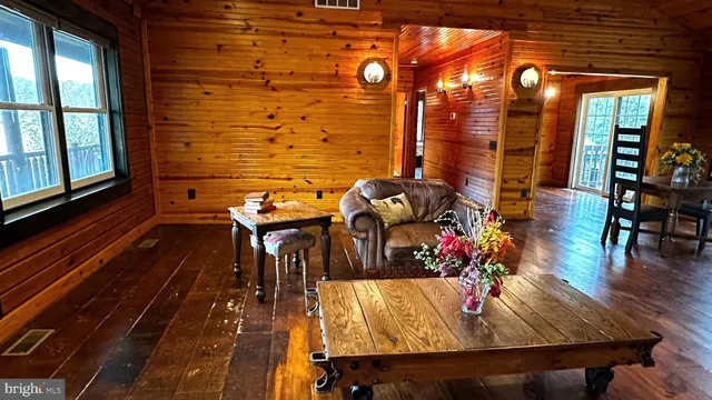 a view of a living room and dining room