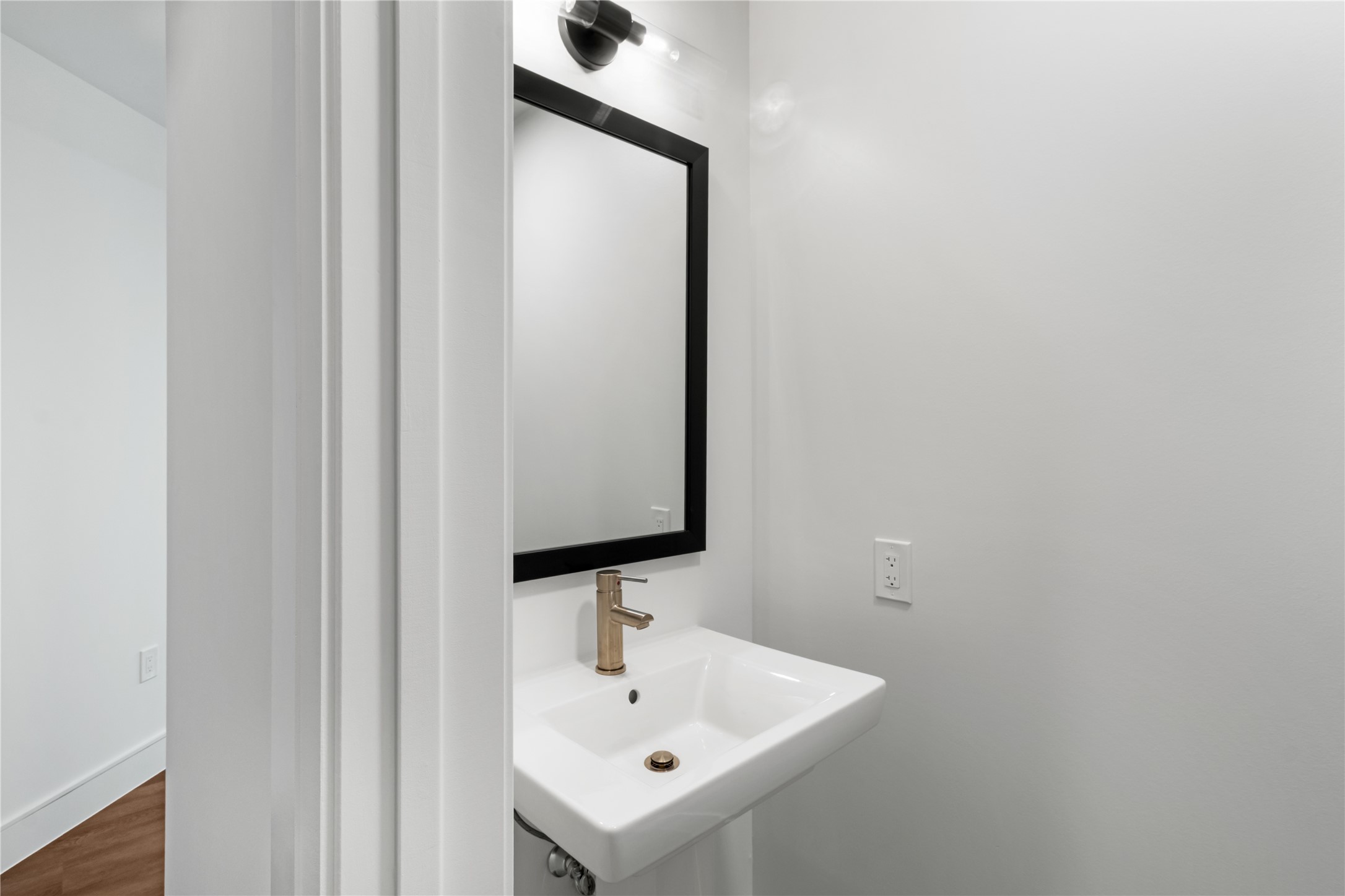 2311 Westheimer Road, Unit 529 Houston, TX 77098 - Photo 17 of 33 a bathroom with a sink and a mirror