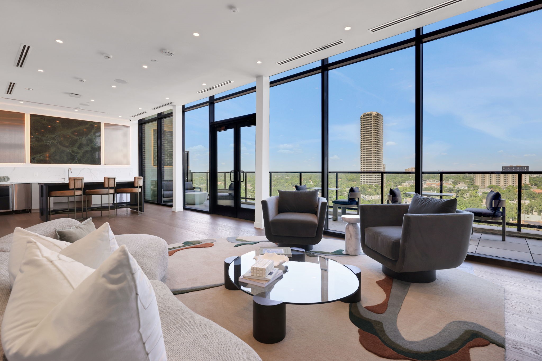 2311 Westheimer Road, Unit 529 Houston, TX 77098 - Photo 31 of 33 a living room with furniture kitchen view and a large window