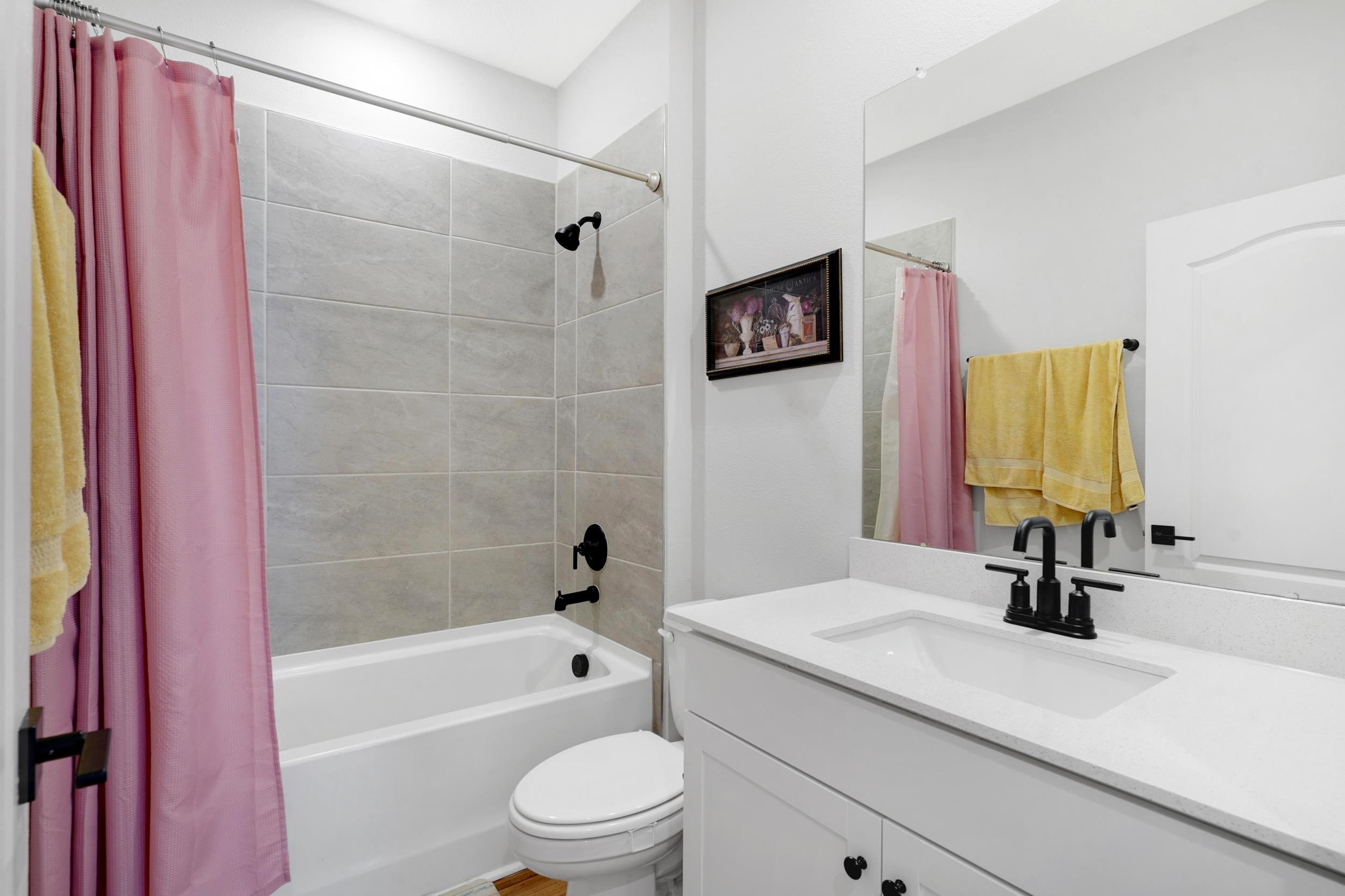 1014 Morgans Treasure Road St. Augustine, FL 32084 - Photo 18 of 31 a bathroom with a sink a toilet a mirror and shower