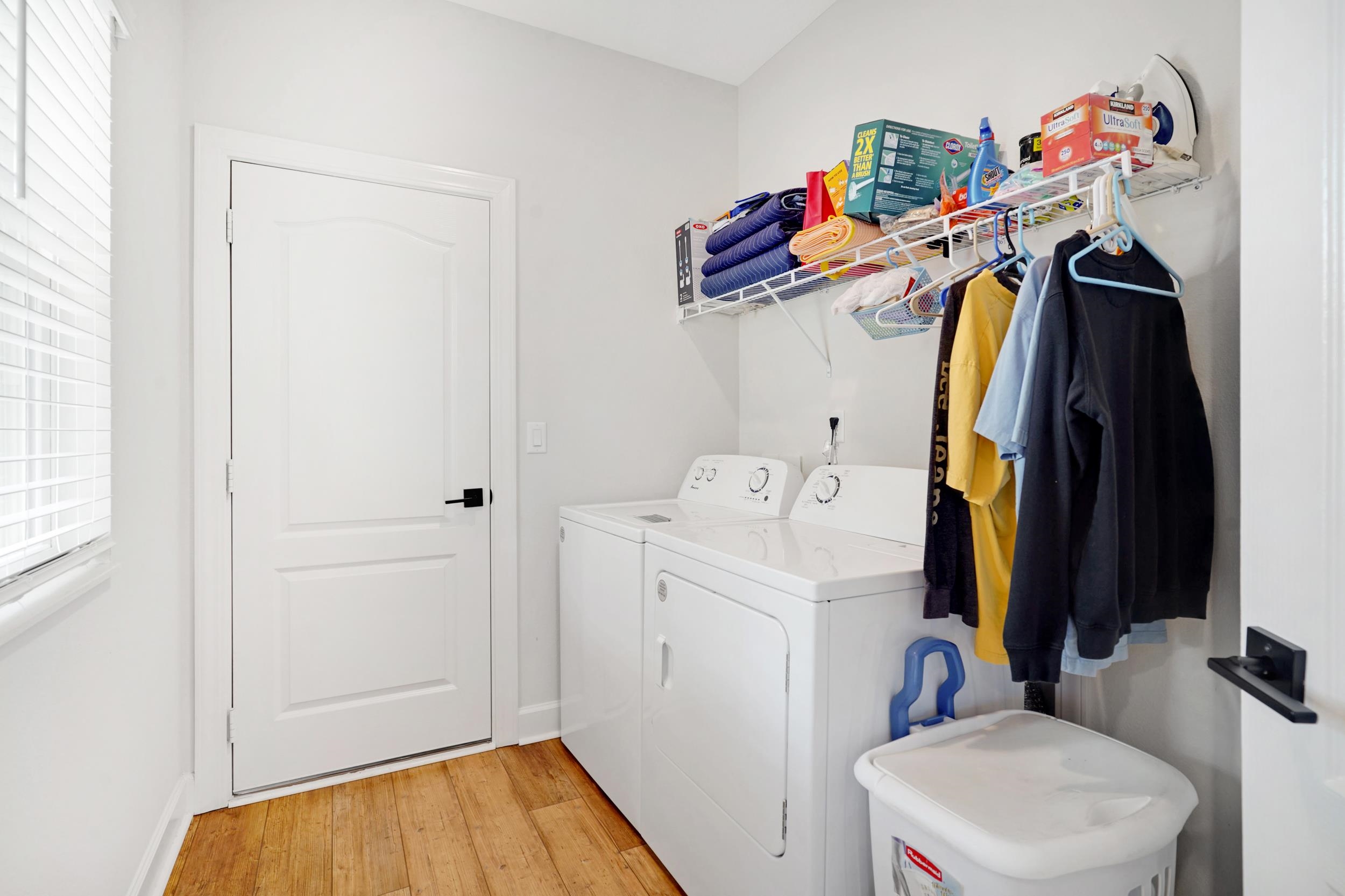 1014 Morgans Treasure Road St. Augustine, FL 32084 - Photo 19 of 31 a view of walk in closet with clothes and shoes