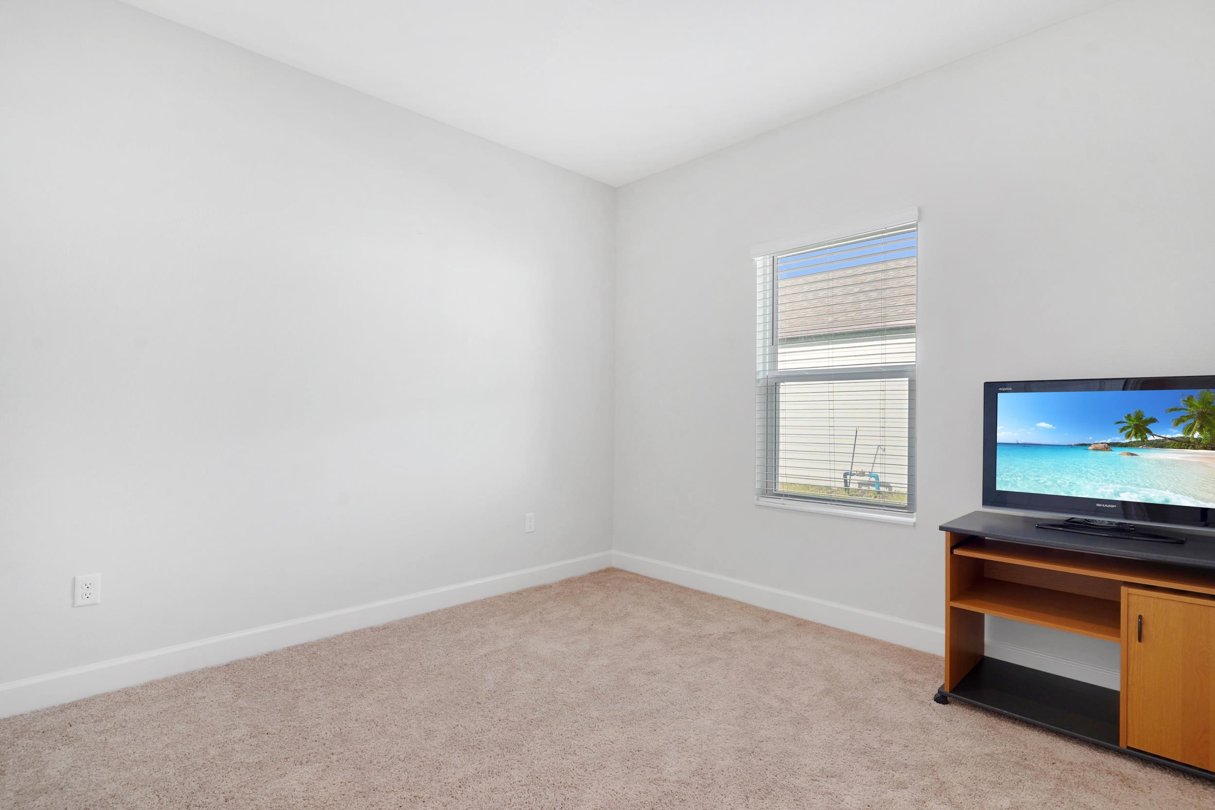 1014 Morgans Treasure Road St. Augustine, FL 32084 - Photo 21 of 31 an empty room with a window