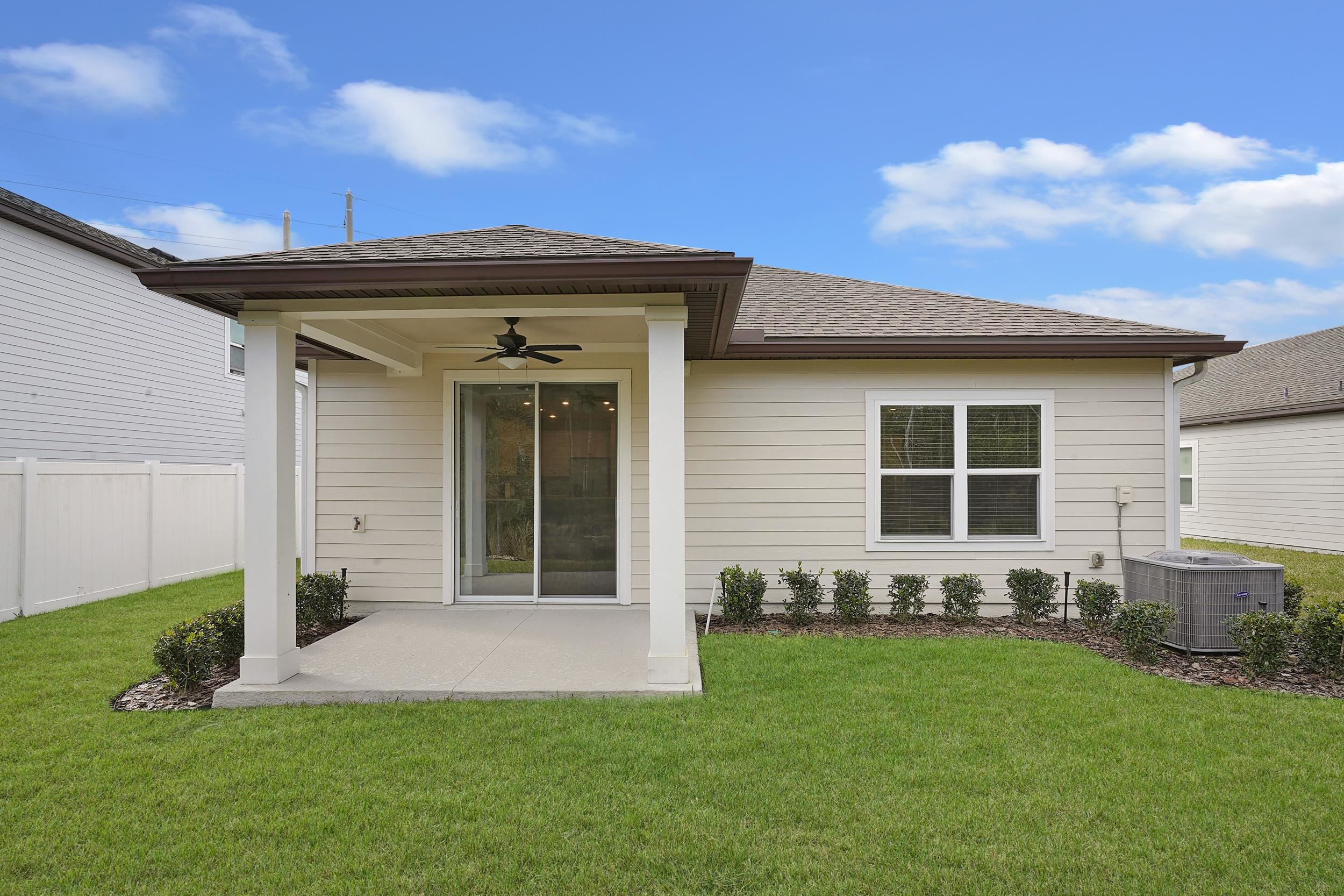 1014 Morgans Treasure Road St. Augustine, FL 32084 - Photo 22 of 31 a view of a house with a yard