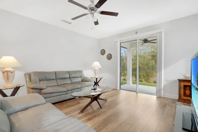 a kitchen with stainless steel appliances a refrigerator sink and cabinets