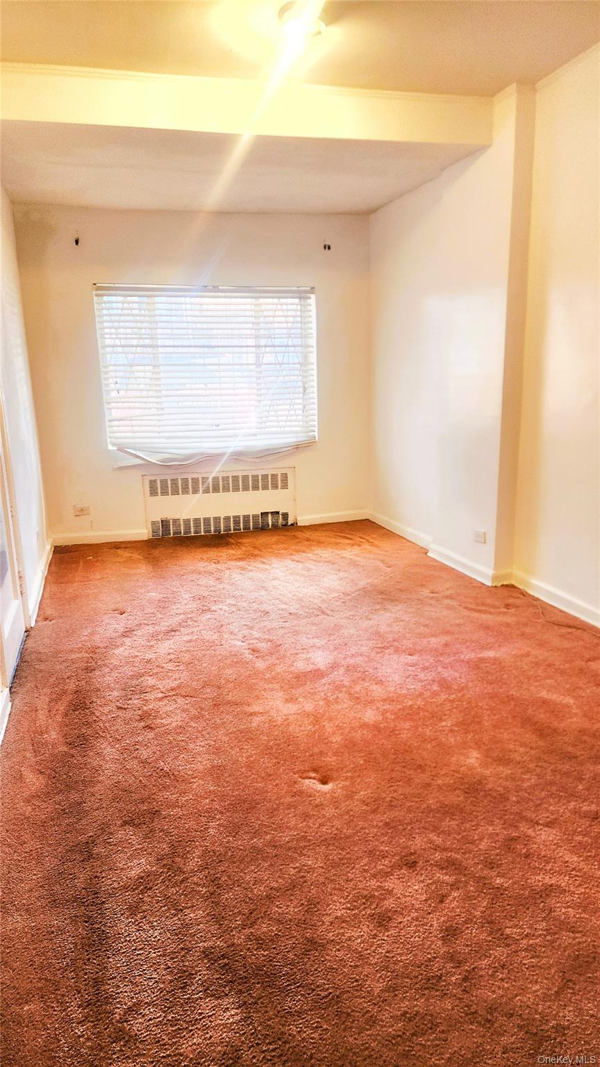 664 Remsen Avenue Brooklyn, NY 11236 - Photo 13 of 40 an empty room with a window