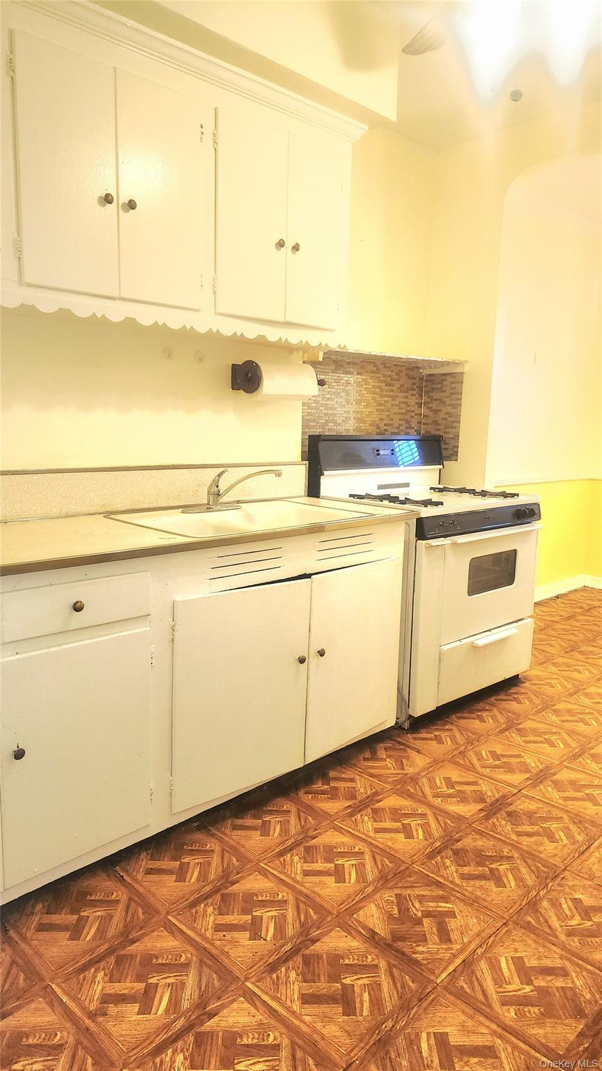 664 Remsen Avenue Brooklyn, NY 11236 - Photo 15 of 40 a view of white kitchen