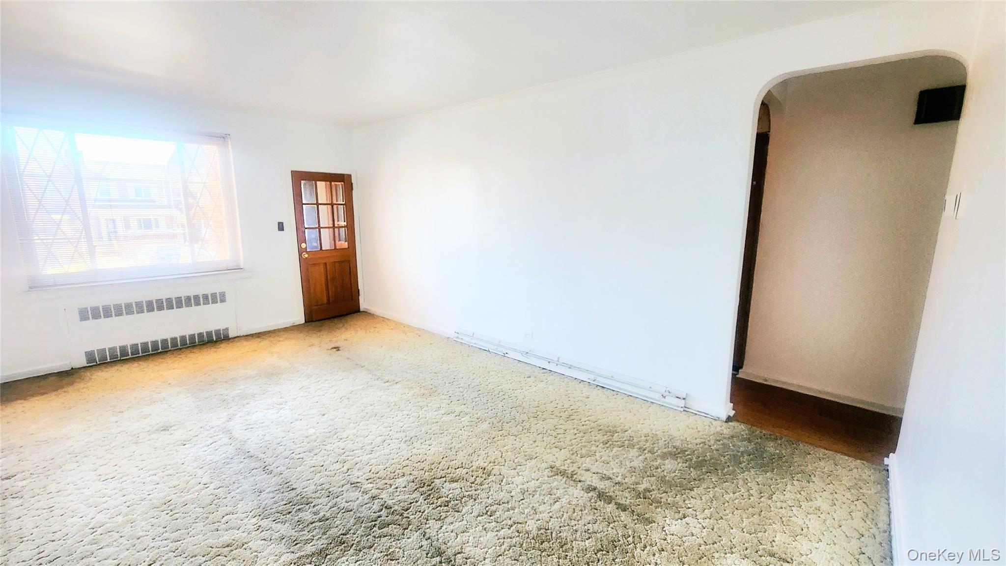 664 Remsen Avenue Brooklyn, NY 11236 - Photo 30 of 40 an empty room with a natural light