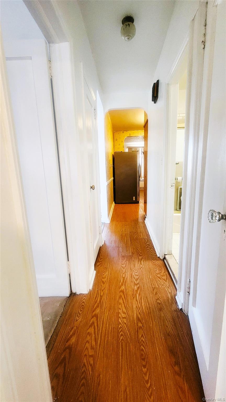 664 Remsen Avenue Brooklyn, NY 11236 - Photo 31 of 40 a bedroom with a bed and a mirror