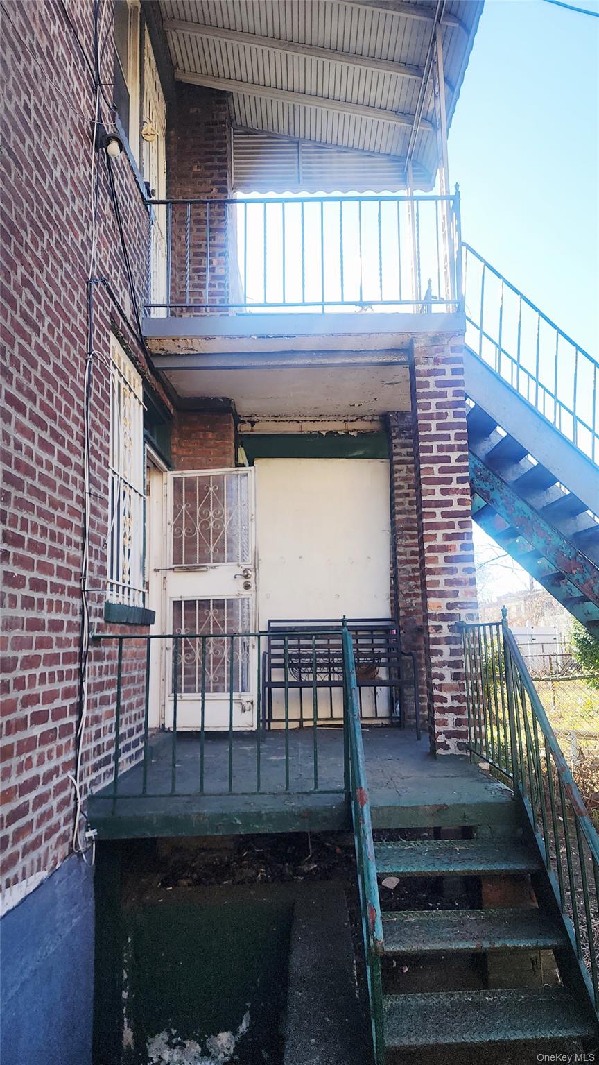 664 Remsen Avenue Brooklyn, NY 11236 - Photo 40 of 40 a view of a patio with a table and chairs